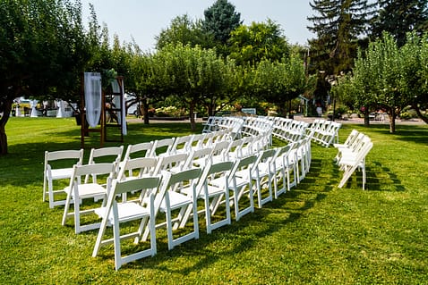 Lacy _ Joey Orchard Ceremony Setup by JOY Photography